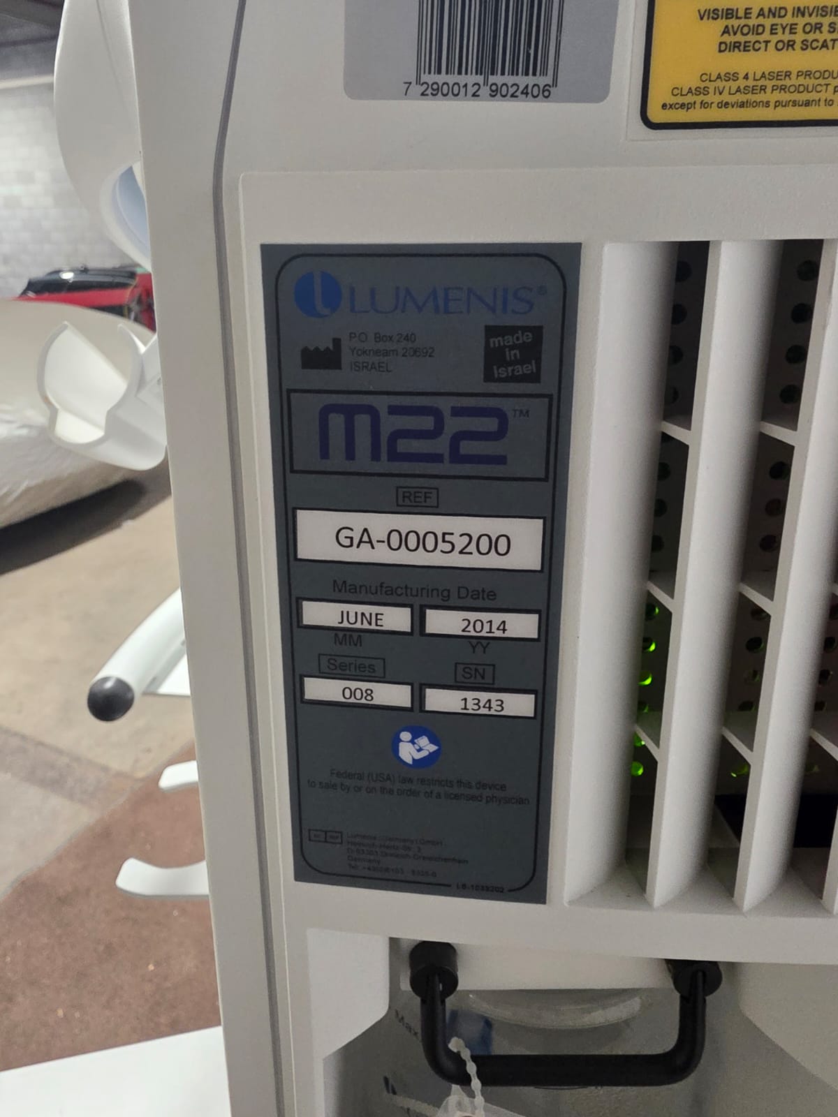 Manufacturer identification plate showing Lumenis M22 and June 2014 manufacture date
